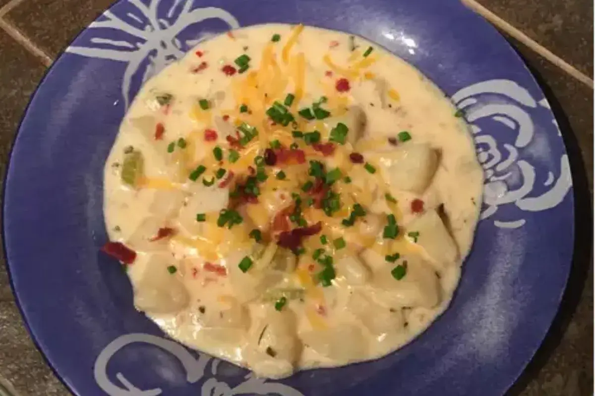 Crock Pot Potato Soup with cheese and bacon garnish