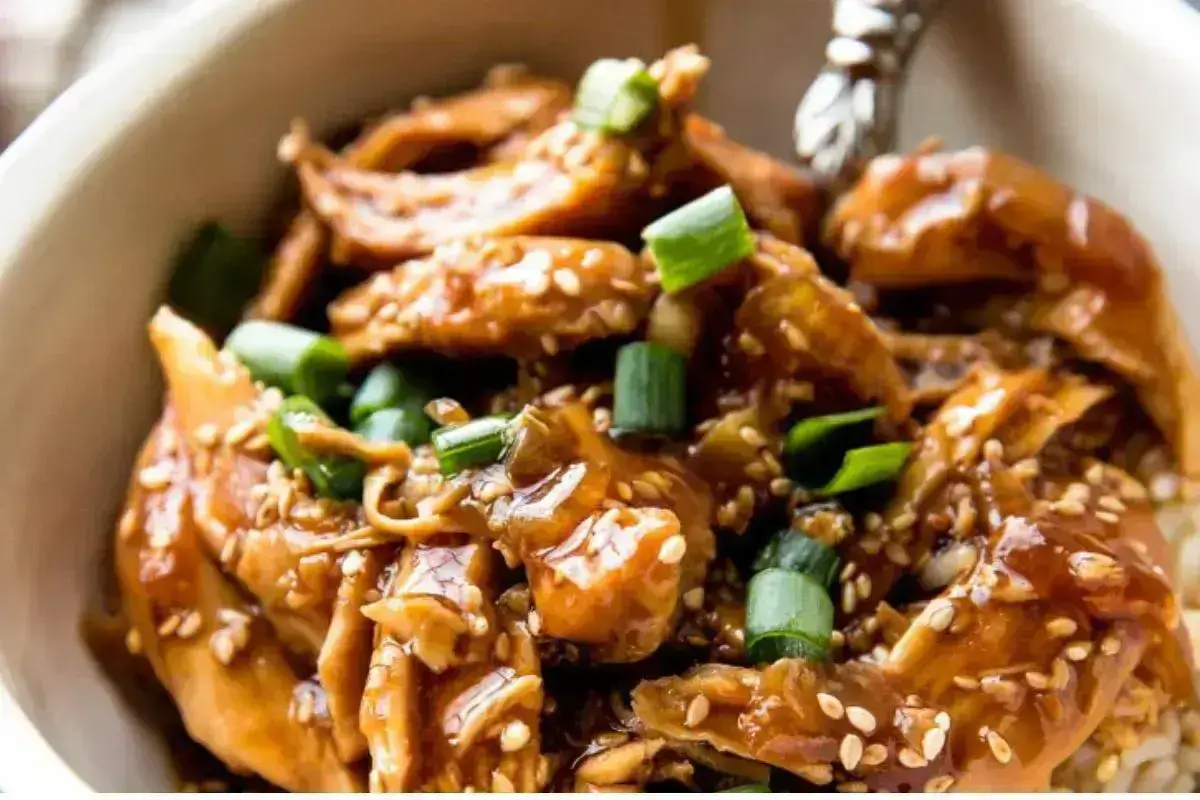 Glazed Teriyaki Chicken with sesame seeds and spring onions garnish