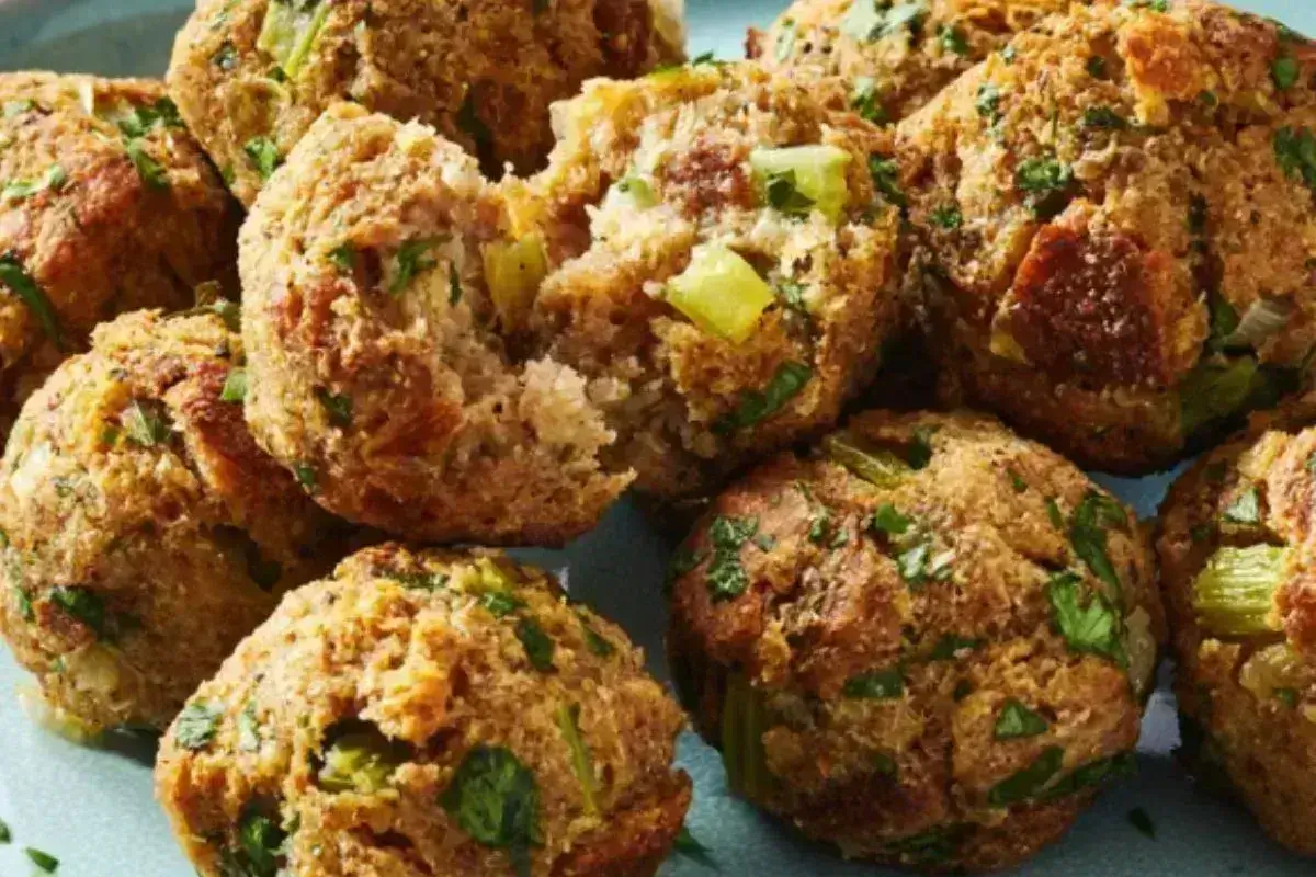 Herb-infused savory stuffing balls served golden and crisp on a festive plate.